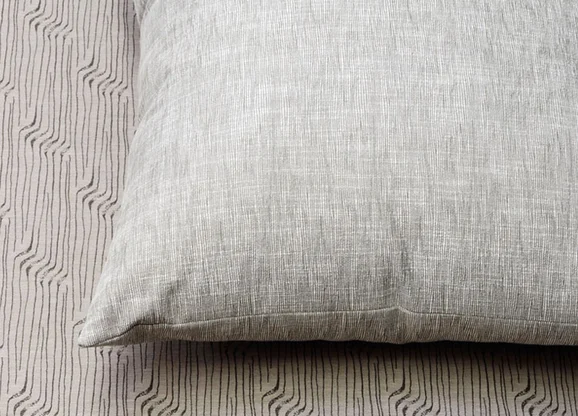 Photo of the fabric Crosshatch 7777 Green Tea 308 in situ by Mokum. Use for Upholstery, Accessory. Style of Plain, Texture