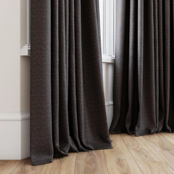 Photo of the fabric Trailblazer Onyx swatch by James Dunlop FibreGuard. Use for Curtains, Upholstery, Accessory, Top of Bed. Style of Texture, Traditional