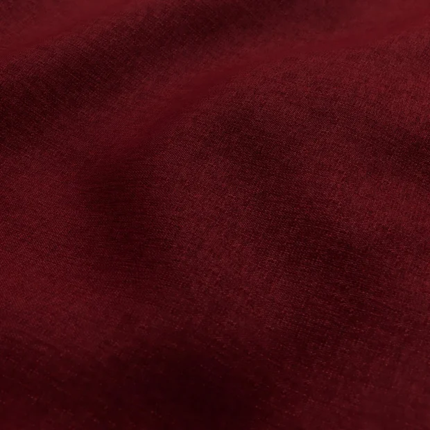 Photo of the fabric Tahiti Crimson swatch by Mokum FibreGuard. Use for Curtains, Upholstery, Accessory, Top of Bed. Style of Chenille, Plain