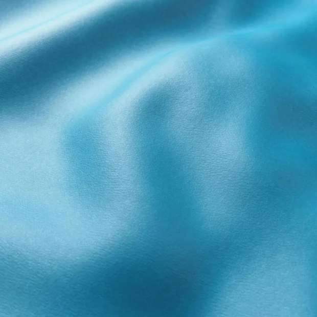 Photo of the fabric Bonanza Mediterranean swatch by Zepel. Use for Upholstery. Style of Leather And Vinyl, Plain