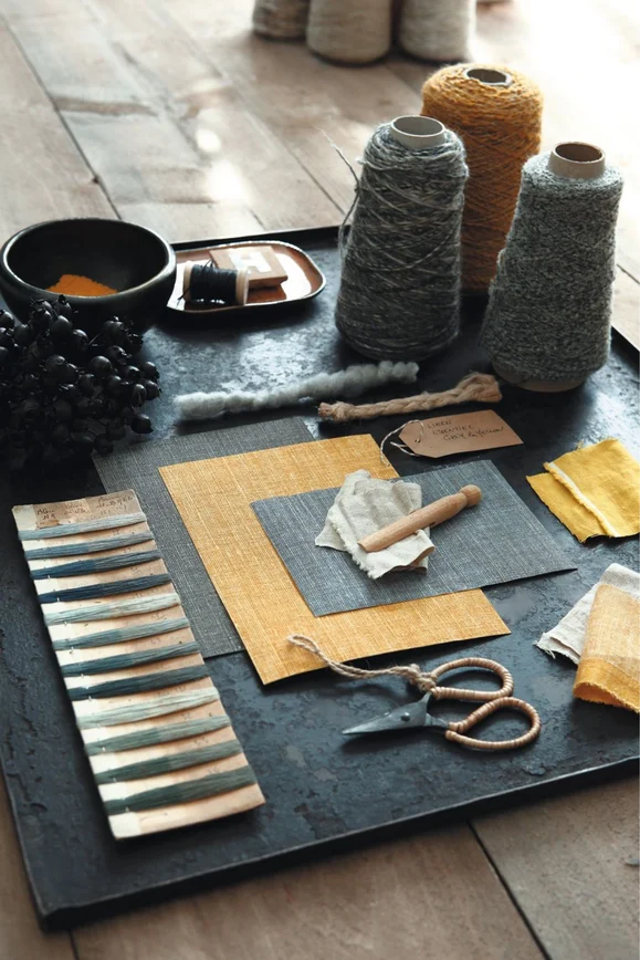 Blue and mustard coloured textile mood board