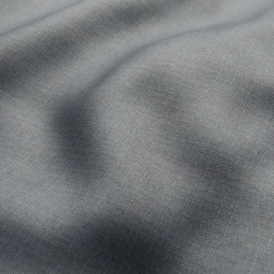 Photo of the fabric Stallion 2 UC Storm swatch by James Dunlop Essentials. Use for Curtains, Accessory. Style of Plain, Texture