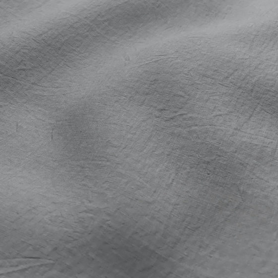 Photo of the fabric Satori Stonewash Dove Grey swatch by Mokum. Use for Curtains, Upholstery Light Duty, Accessory, Top of Bed. Style of Plain, Texture