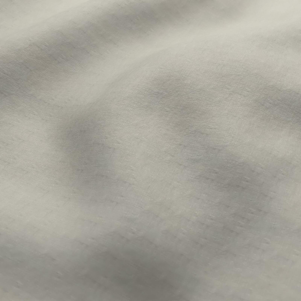 Photo of the fabric Satori Stonewash Parchment swatch by Mokum. Use for Curtains, Upholstery Light Duty, Accessory, Top of Bed. Style of Plain, Texture