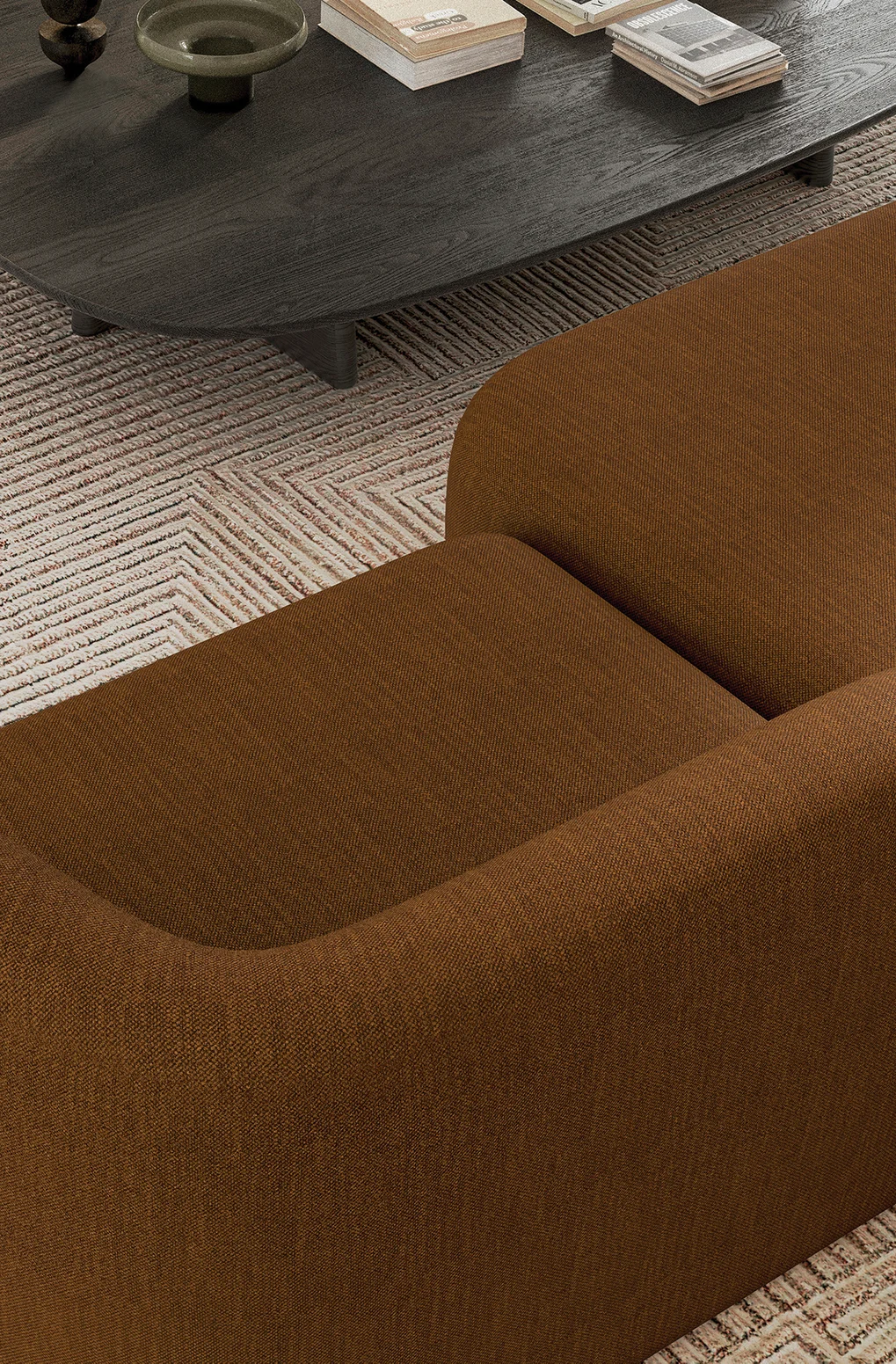 Terracotta colour sofa in modern interior setting