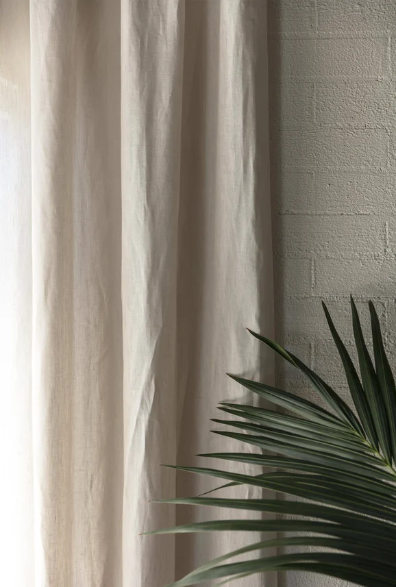 Photo of the fabric Linen Natural in situ by James Dunlop. Use for Curtains, Accessory. Style of Plain, Texture