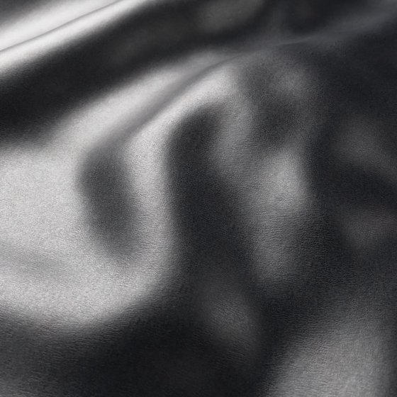 Photo of the fabric Tannery Raven swatch by Zepel. Use for Upholstery, Accessory, Top of Bed. Style of Leather And Vinyl, Plain