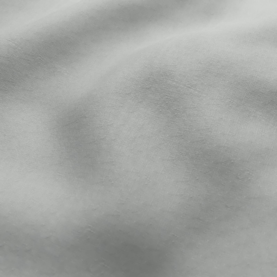 Photo of the fabric Satori Stonewash Silver Birch swatch by Mokum. Use for Curtains, Upholstery Light Duty, Accessory, Top of Bed. Style of Plain, Texture