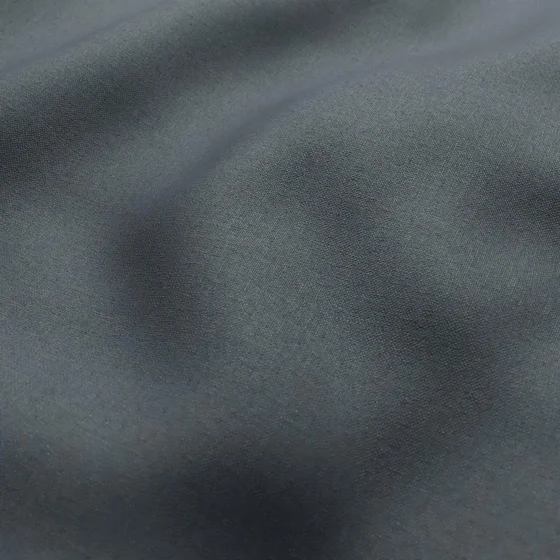 Photo of the fabric Kanvas Petrol swatch by Zepel FibreGuard. Use for Curtains, Upholstery, Accessory, Top of Bed. Style of Plain, Taffeta