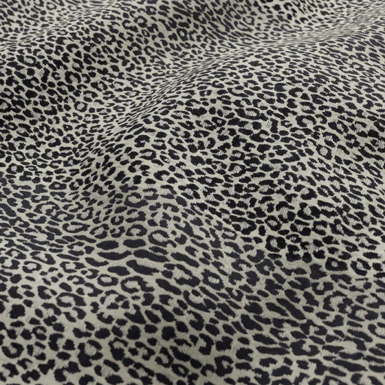 Photo of the fabric Leopardo Onyx swatch by Catherine Martin by Mokum. Use for Upholstery, Accessory. Style of Abstract, Jacquard
