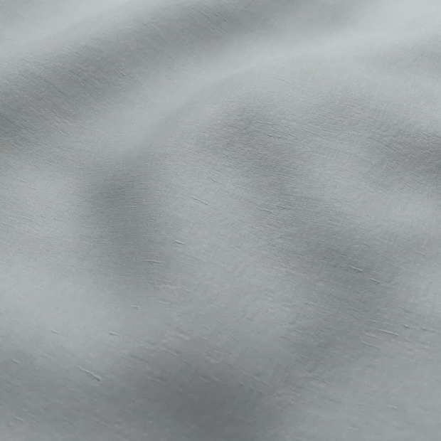 Photo of the fabric Satori Stonewash Duckegg Blue swatch by Mokum. Use for Curtains, Upholstery Light Duty, Accessory, Top of Bed. Style of Plain, Texture