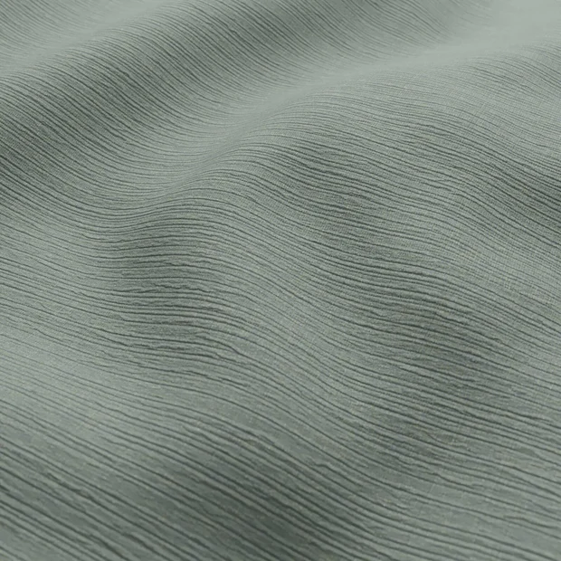 Photo of the fabric Northstar Jade swatch by Zepel. Use for Curtains, Accessory, Top of Bed. Style of Dim Out, Plain