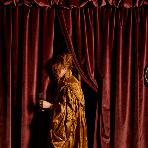 Ruby Shields in Courture colour Ochre, Curtains in Velvelux colour Ruby | Photography by Martina Gemmola