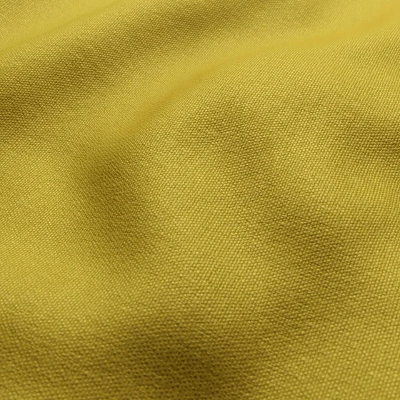 Photo of the fabric Pueblo Chartreuse swatch by Mokum. Use for Upholstery, Accessory. Style of Plain, Texture