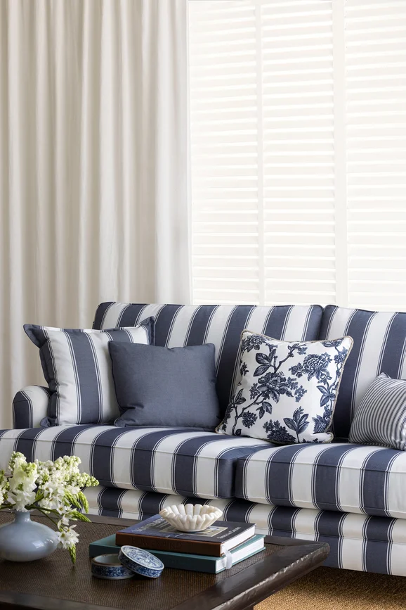 Photo of the fabric Perennial Stripe Linen in situ by James Dunlop. Use for Upholstery, Accessory. Style of Stripe, Taffeta
