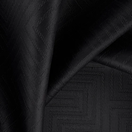 Photo of the fabric Remain Onyx swatch by FR-One. Use for Curtains, Upholstery, Accessory, Top of Bed. Style of Geometric, Velvet