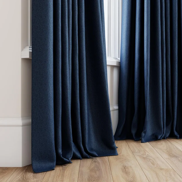 Photo of the fabric Trailblazer Navy swatch by James Dunlop FibreGuard. Use for Curtains, Upholstery, Accessory, Top of Bed. Style of Texture, Traditional