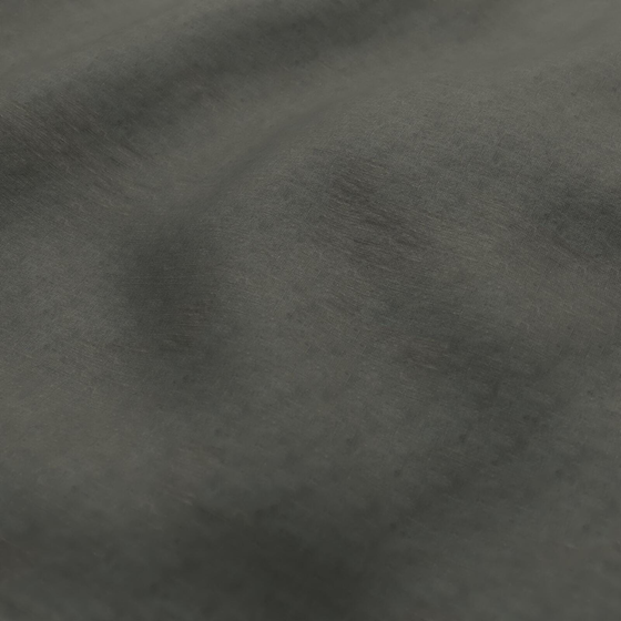 Photo of the fabric Satori Stonewash Riverstone swatch by Mokum. Use for Curtains, Upholstery Light Duty, Accessory, Top of Bed. Style of Plain, Texture