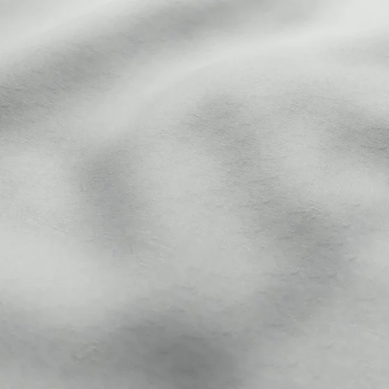 Photo of the fabric Satori Stonewash Silver Birch swatch by Mokum. Use for Curtains, Upholstery Light Duty, Accessory, Top of Bed. Style of Plain, Texture