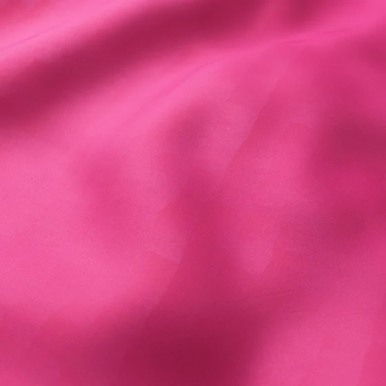 Photo of the fabric Catwalk Fuchsia swatch by Zepel. Use for Curtains, Upholstery Light Duty, Accessory, Top of Bed. Style of Plain, Taffeta