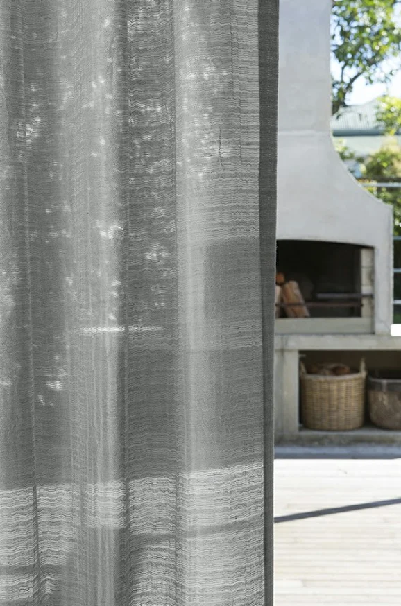 Photo of the fabric Antiquity Nightshade in situ by James Dunlop Essentials. Use for Sheer Curtains. Style of Plain, Sheer