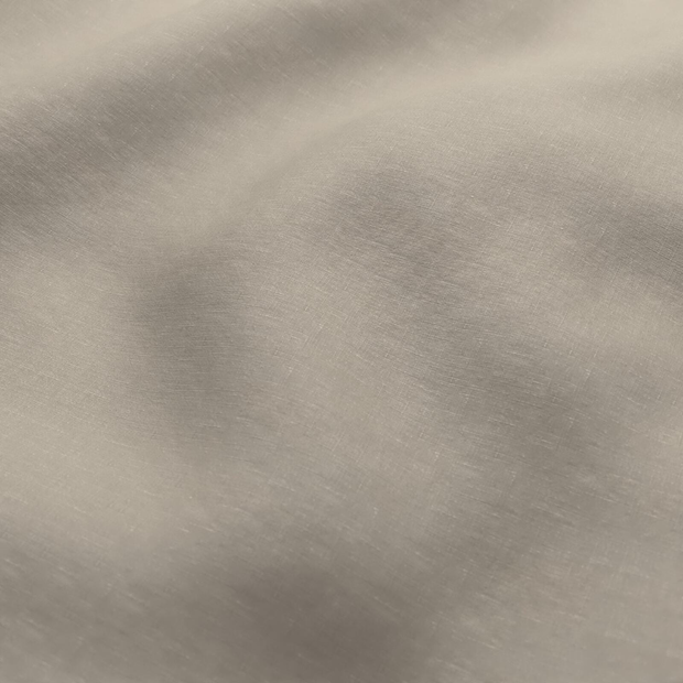 Photo of the fabric Satori Stonewash Linen swatch by Mokum. Use for Curtains, Upholstery Light Duty, Accessory, Top of Bed. Style of Plain, Texture