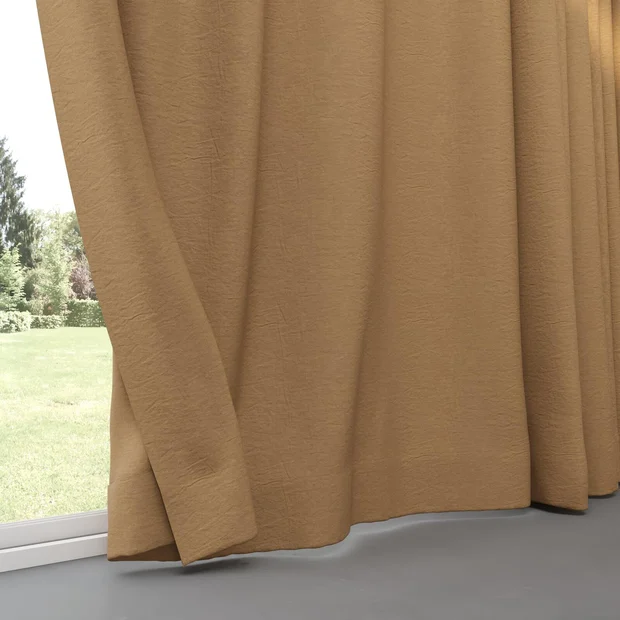 Photo of the fabric Satori Stonewash Ochre swatch by Mokum. Use for Curtains, Upholstery Light Duty, Accessory, Top of Bed. Style of Plain, Texture