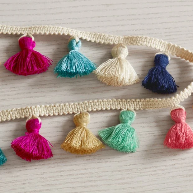 Photo of the fabric Tufty Braid Vnt84 01 swatch by Villa Nova. Use for Trim