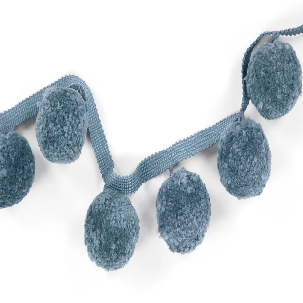 Photo of the fabric Big Poms Braid T93 03 swatch by Villa Nova. Use for Trim