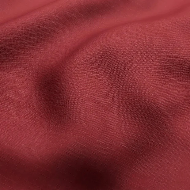 Photo of the fabric Stallion 2 Blackout Bordeaux swatch by James Dunlop Essentials. Use for Curtains. Style of Plain, Texture