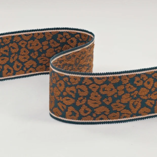 Photo of the fabric Leopard Braid T123 02 swatch by Romo. Use for Accessory