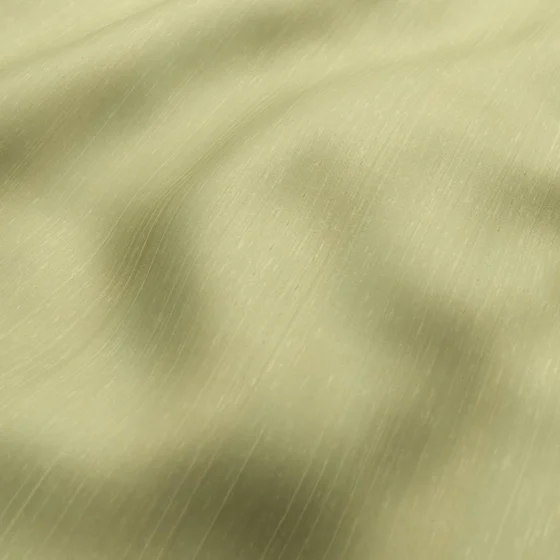Photo of the fabric Luxe Pistachio swatch by James Dunlop Essentials. Use for Curtains, Accessory, Top of Bed. Style of Plain, Texture