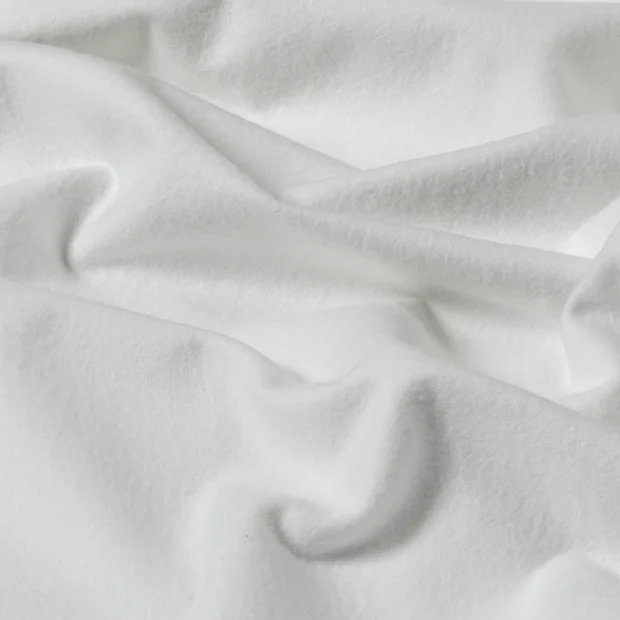 Photo of the fabric Dreamline 280 Blackout White swatch by James Dunlop. Use for Curtain Lining. Style of Plain