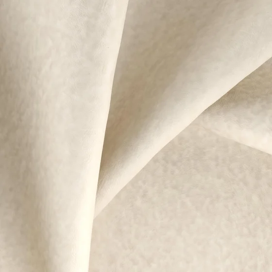 Photo of the fabric Tanning Sesame swatch by Zepel. Use for Upholstery, Accessory, Top of Bed. Style of Leather And Vinyl, Plain