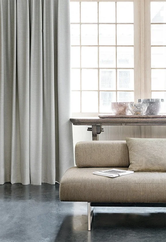Photo of the fabric Provence Albatros in situ by James Dunlop Essentials. Use for Curtains, Upholstery, Accessory, Top of Bed. Style of Plain, Texture