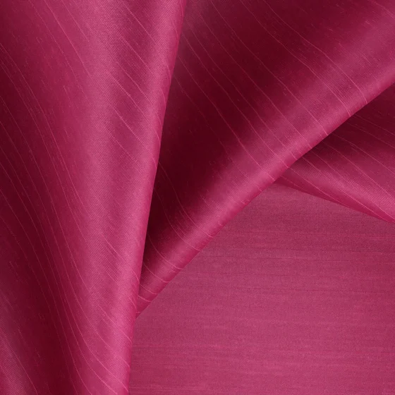 Photo of the fabric Silky Magenta swatch by Zepel. Use for Curtains, Accessory, Top of Bed. Style of Plain, Texture