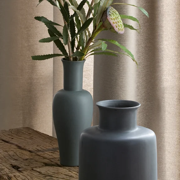 Photo of the fabric Zen 11604 Burnished Gold in situ by Mokum. Use for Curtains, Accessory. Style of Plain