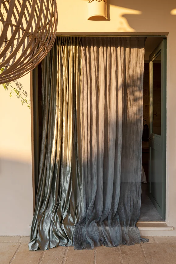 Photo of the fabric Inversa 14624 400 in situ by Fischbacher 1819. Use for Curtains, Accessory. Style of Plain