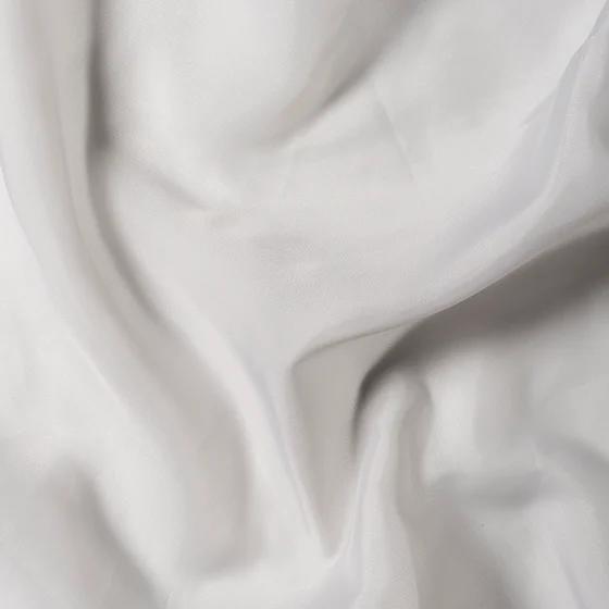 Photo of the fabric De Mundo II Feather swatch by James Dunlop. Use for Sheer Curtains. Style of Plain, Sheer