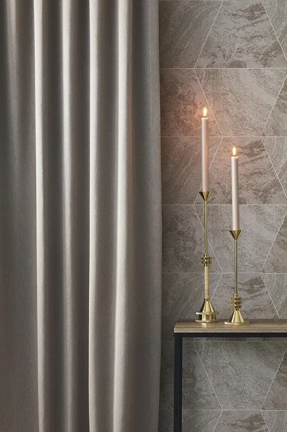 Photo of the fabric Shield FR Blackout Denim in situ by James Dunlop Essentials. Use for Curtains. Style of Plain