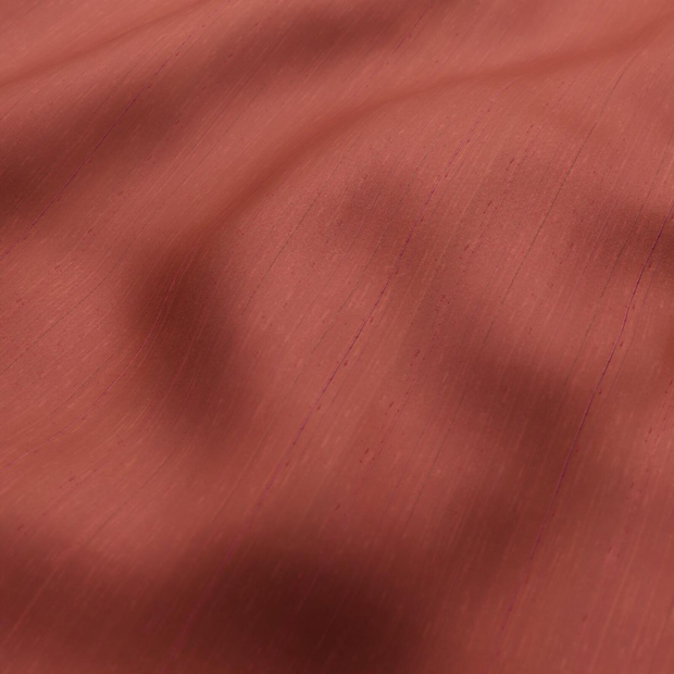 Photo of the fabric Luxe Berry swatch by James Dunlop Essentials. Use for Curtains, Accessory, Top of Bed. Style of Plain, Texture