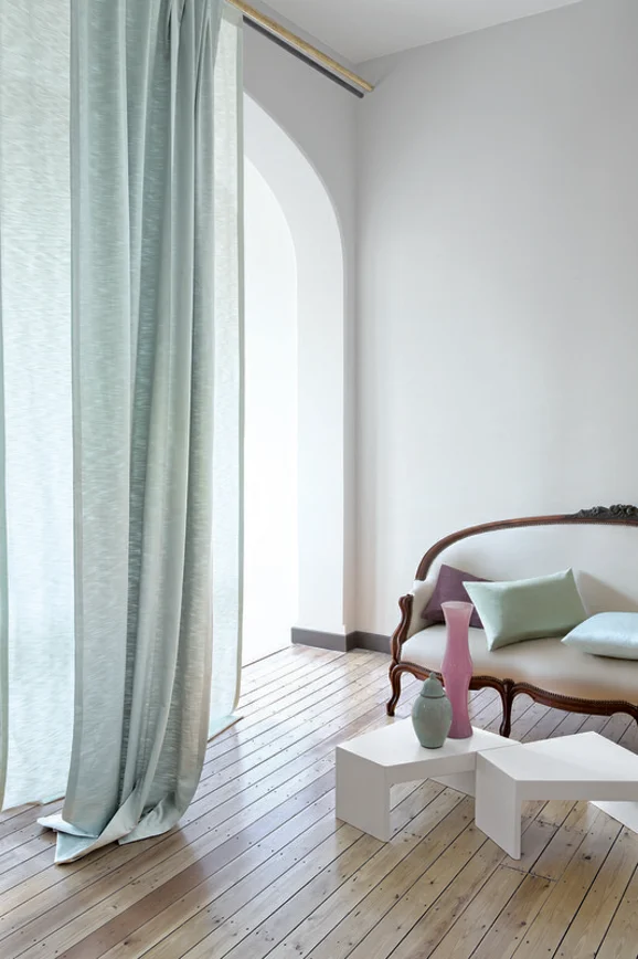 Photo of the fabric Raider Putty in situ by Zepel. Use for Curtains, Upholstery, Accessory, Top of Bed. Style of Plain, Texture