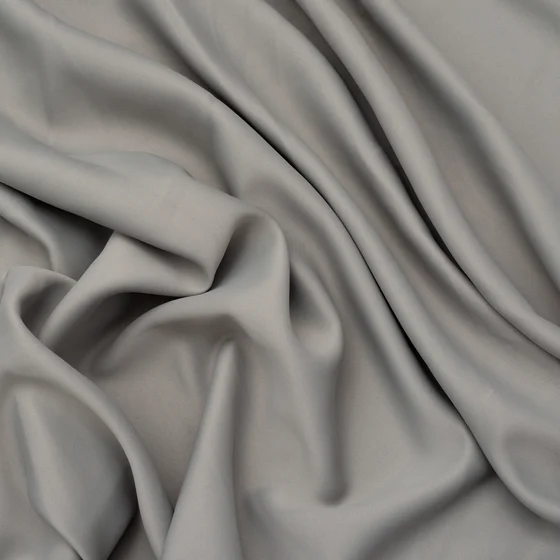Photo of the fabric Comfortline Riverstone swatch by Linings. Use for Curtains. Style of Dim Out, Plain