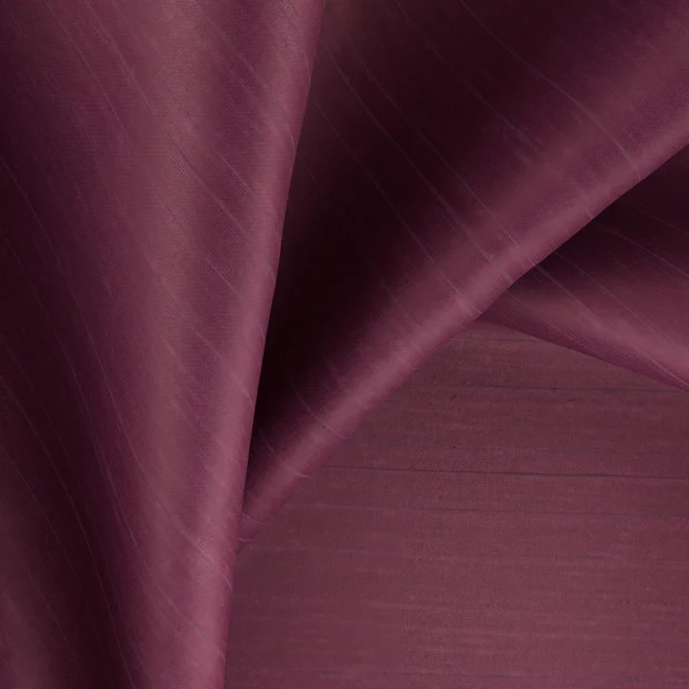 Photo of the fabric Silky Plum swatch by Zepel. Use for Curtains, Accessory, Top of Bed. Style of Plain, Texture