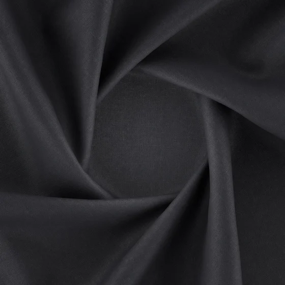 Photo of the fabric Kanvas Ebony swatch by Zepel FibreGuard. Use for Curtains, Upholstery, Accessory, Top of Bed. Style of Plain, Taffeta