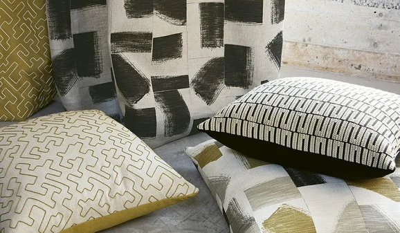 Photo of the fabric Kente V3302 09 in situ by Villa Nova. Use for Curtains, Upholstery, Accessory. Style of Geometric