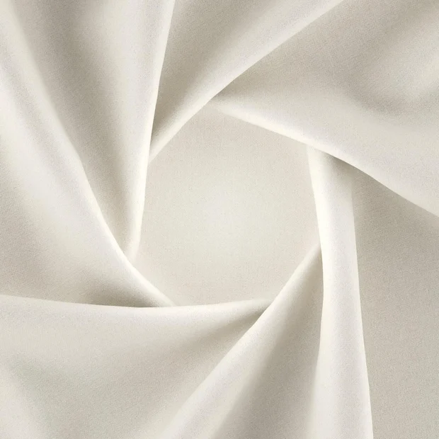Photo of the fabric Kanvas Nougat swatch by Zepel FibreGuard. Use for Curtains, Upholstery, Accessory, Top of Bed. Style of Plain, Taffeta