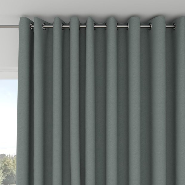 Photo of the fabric Satori Stonewash Teal swatch by Mokum. Use for Curtains, Upholstery Light Duty, Accessory, Top of Bed. Style of Plain, Texture