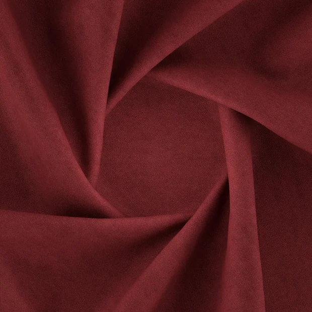 Photo of the fabric Convoy Burgundy swatch by Zepel FibreGuard. Use for Upholstery, Accessory, Top of Bed. Style of Plain, Texture