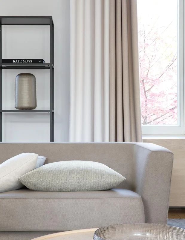 Photo of the fabric Dynamic Vino in situ by Zepel. Use for Curtains, Upholstery, Accessory, Top of Bed. Style of Plain, Texture